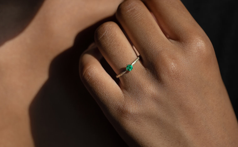 Emerald Stardust Ring worn on